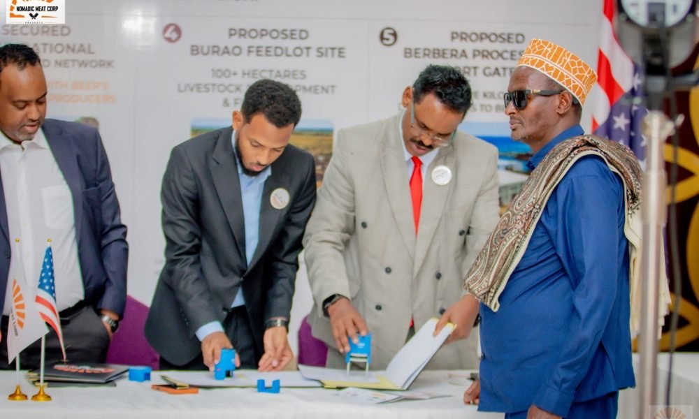 Participants signing documents at NMC’s July 27, 2026 event in Hargeisa